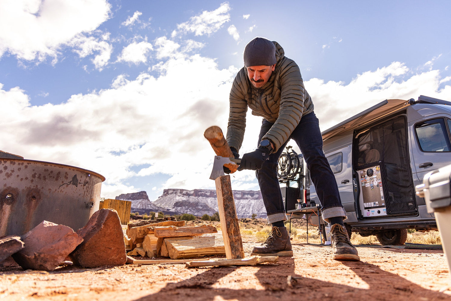 Man splitting wood witha Pack Hatchet