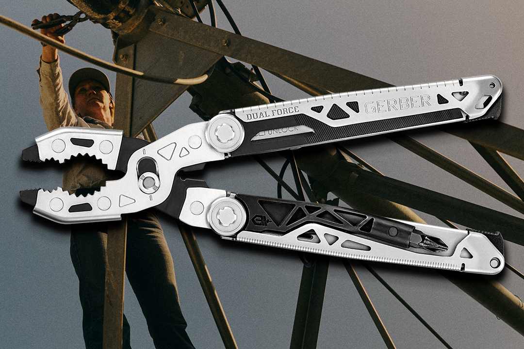 A Center-Drive multi-tool with silver and black metallic components, shown in an outdoor setting with a worker in the background.